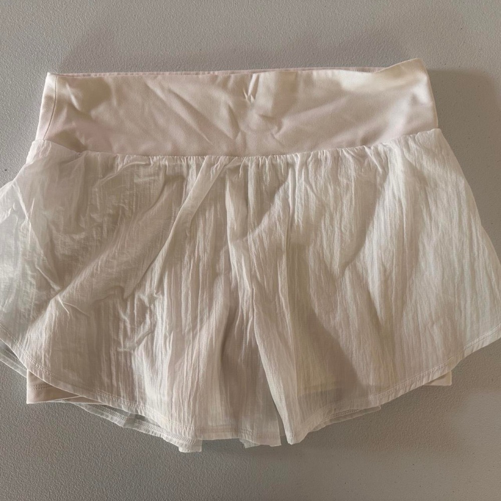 White in motion skirt with built in shorts size L